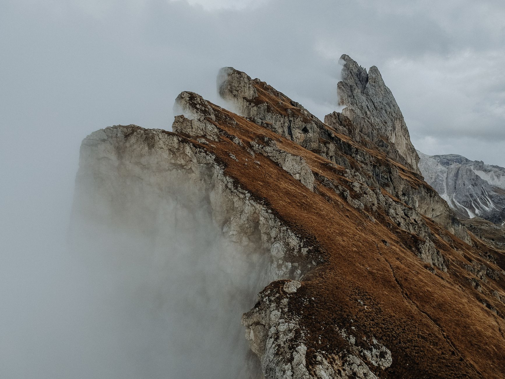 Dolomite mountain needles bathed in morning mist